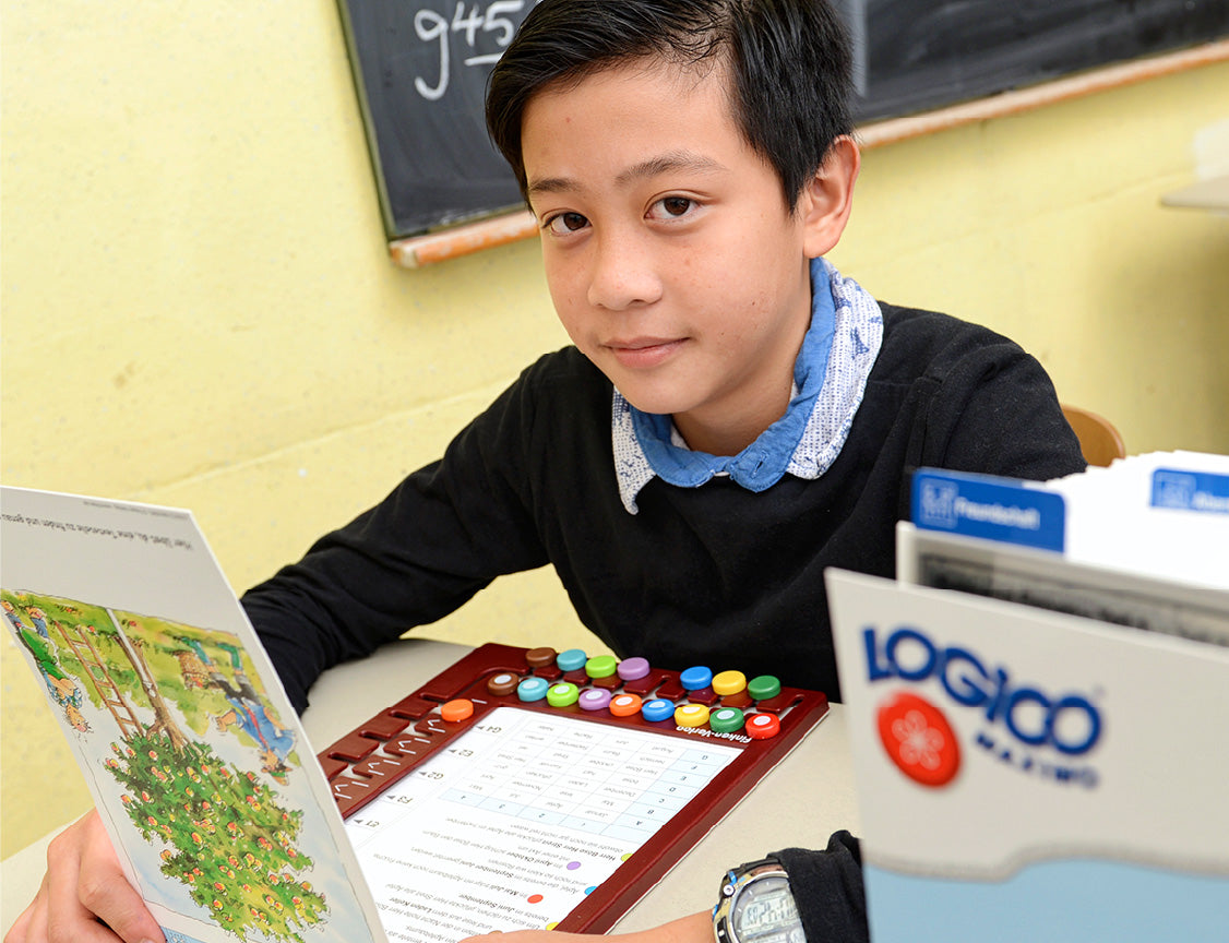  LOGICO MAXIMO feature: Develops Advanced Cognitive Skills, showing a boy working on a complex learning card.